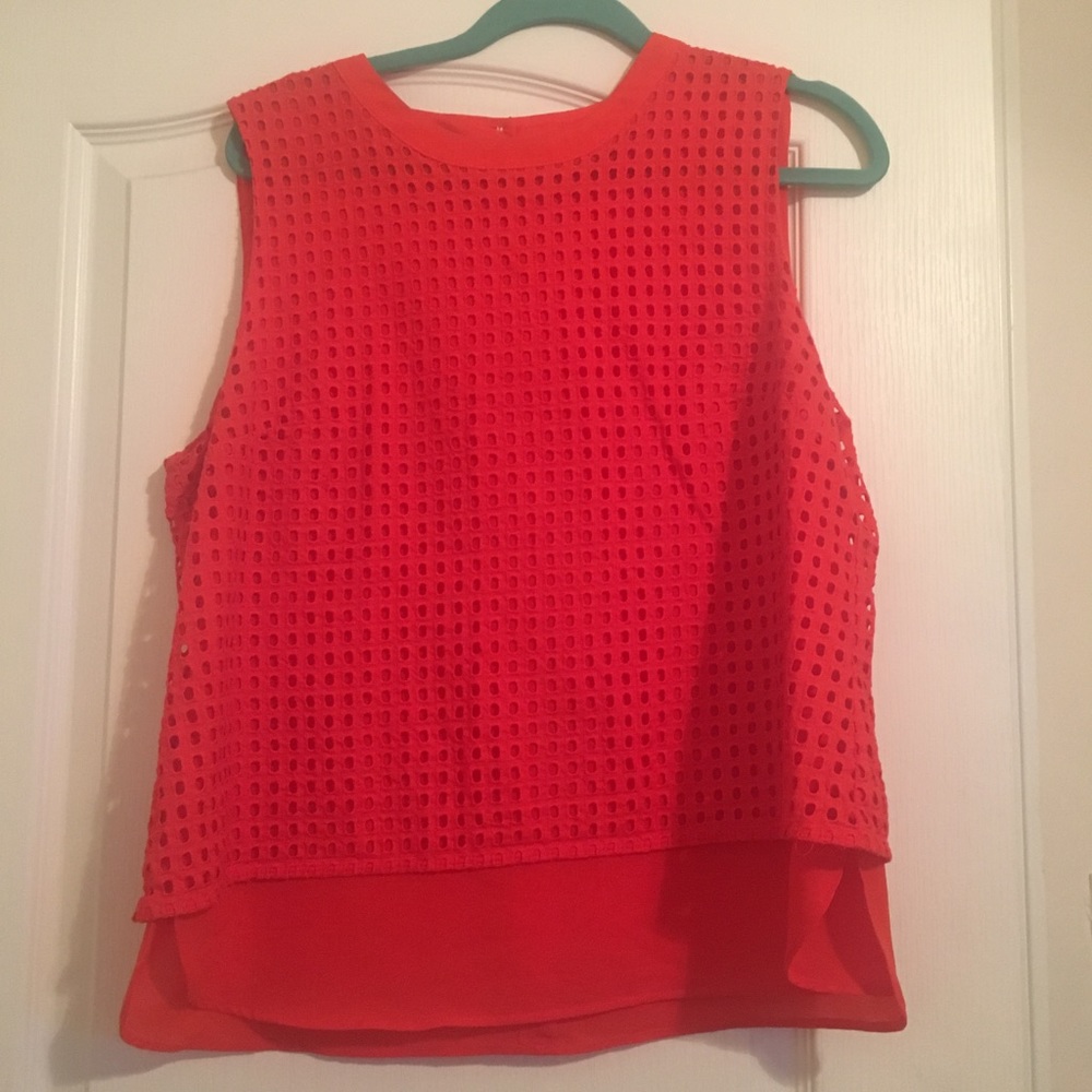 Red sleeveless blouse